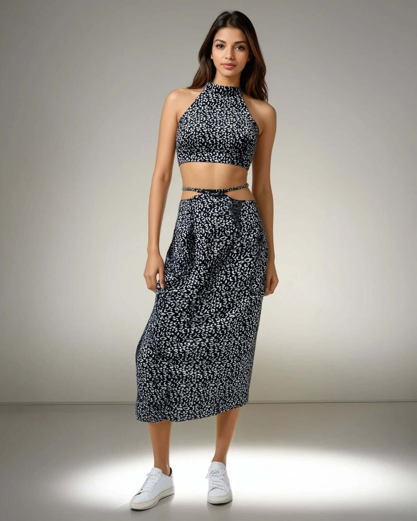 Model showcasing the Blue Bliss Two-Piece Set, featuring a halter neck top and stylish skirt from House Of Majisha, perfect for summer vacations and brunch outings.