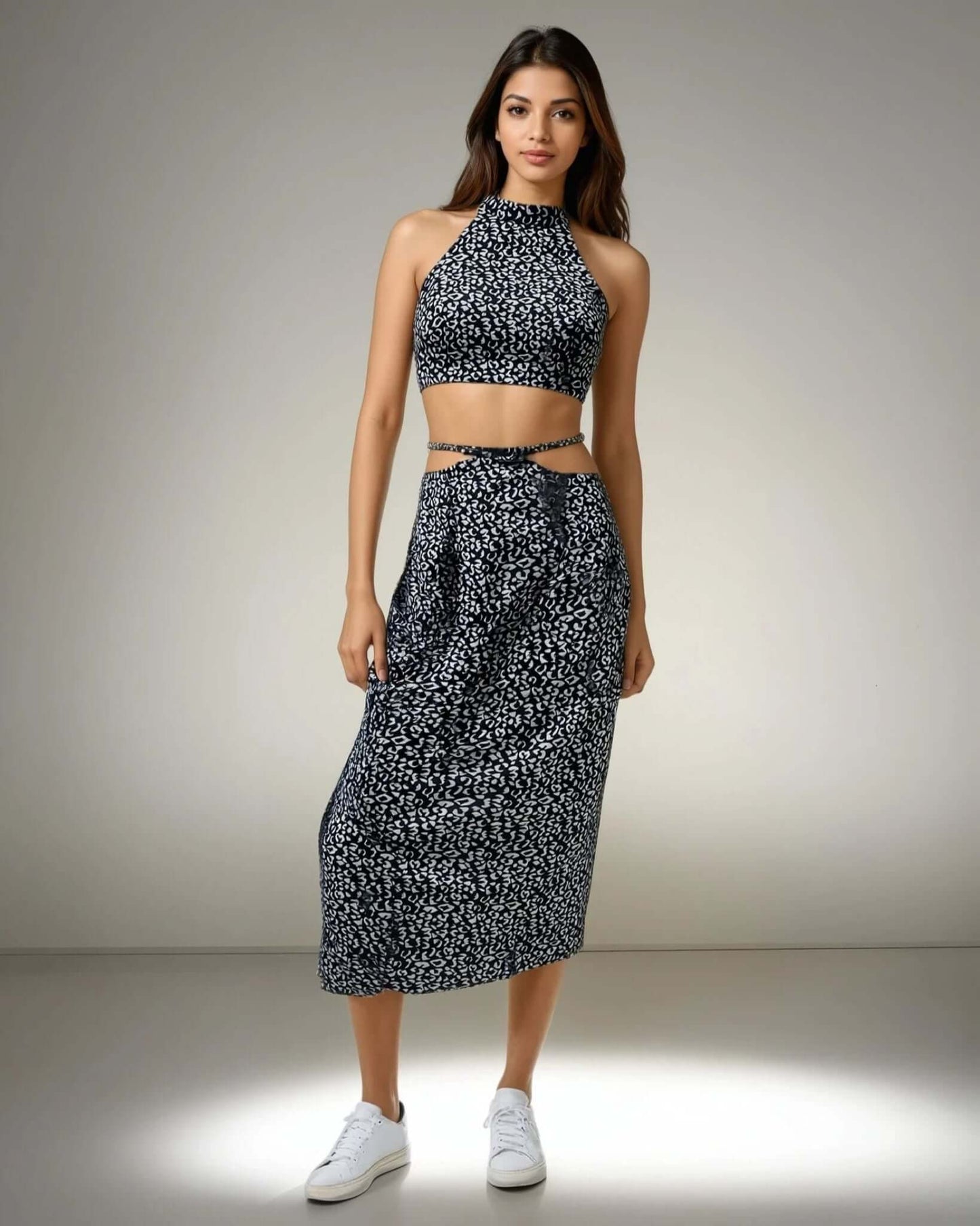Model showcasing the Blue Bliss Two-Piece Set, featuring a halter neck top and stylish skirt from House Of Majisha, perfect for summer vacations and brunch outings.