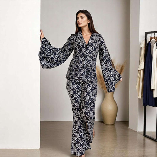 Model showcasing the Elegant Embroidered Coord Set in dark blue from House Of Majisha, featuring intricate embroidery and bell sleeves, perfect for formal and party occasions.