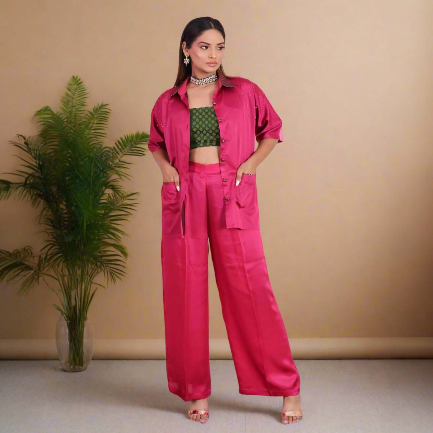 Vibrant Fuchsia Pink Satin Coord Set for Women - Featuring a stylish oversized shirt with brocade accents, wide-legged pants, and a green brocade crop top. Perfect for festive and party wear.