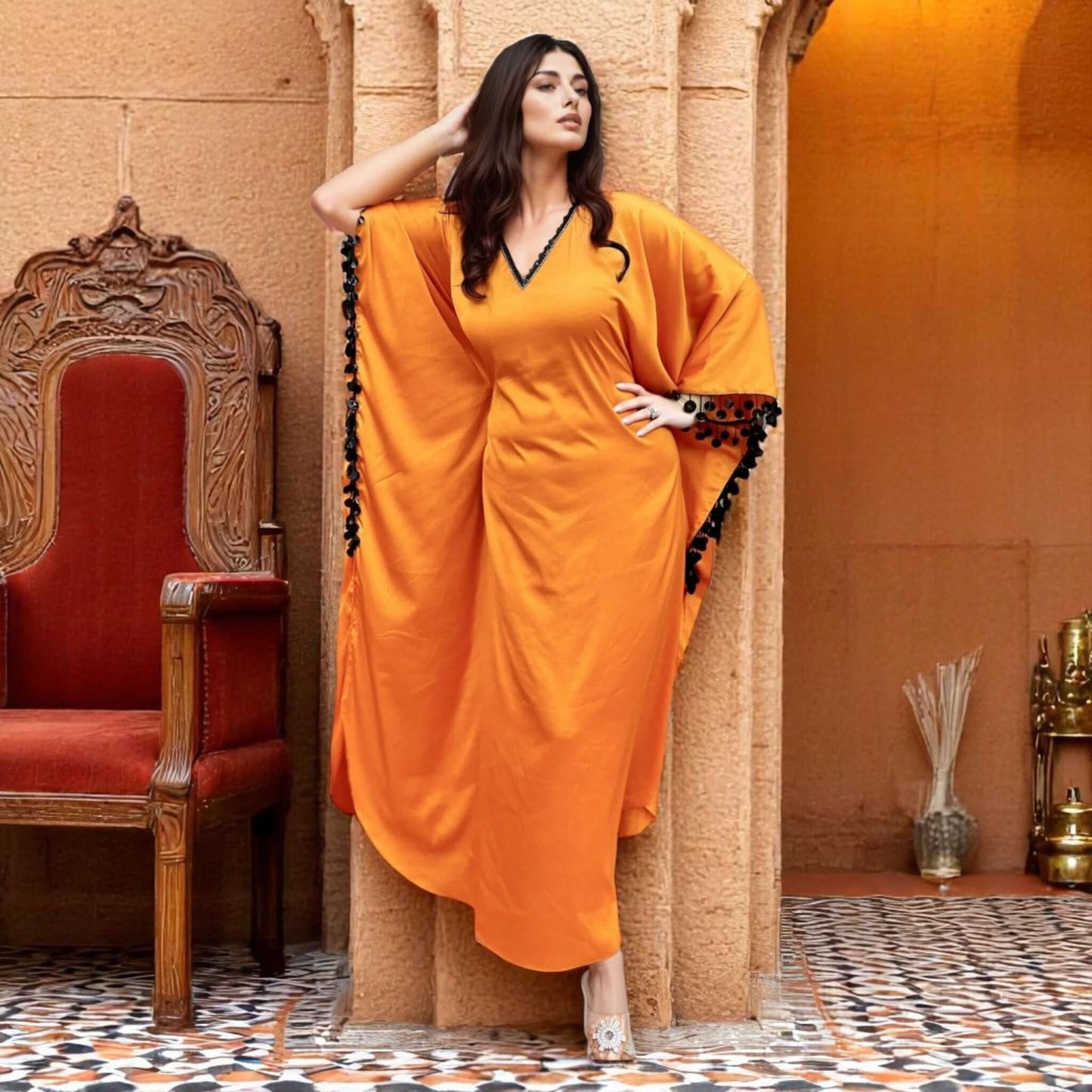 Shine at your next event with the Glamorous Orange Satin Dress from House Of Majisha. Perfect for parties, this elegant dress features lace detailing and is available in multiple sizes.