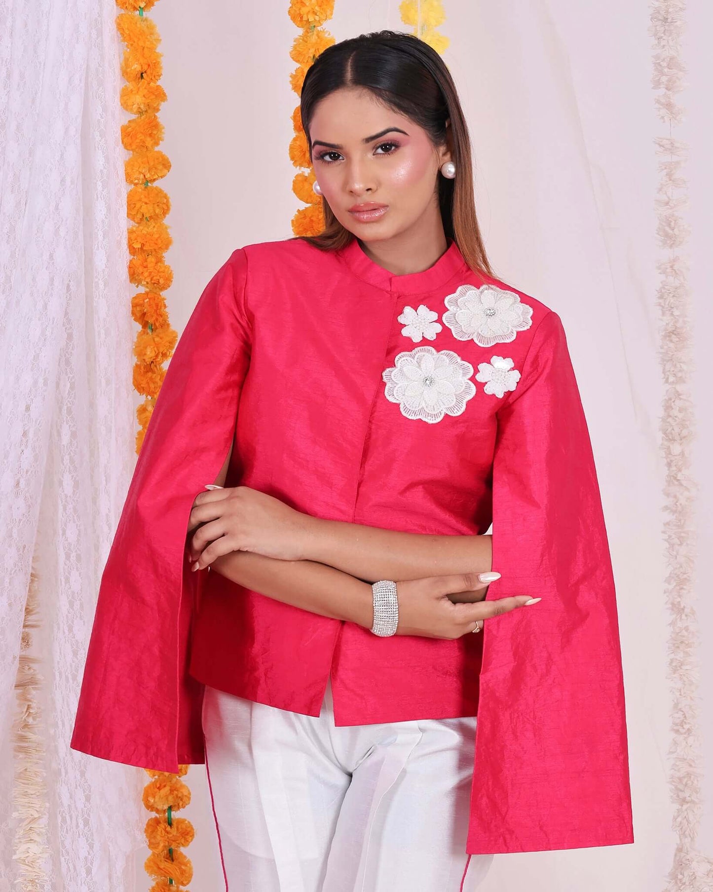 Stylish pink floral patch jacket and white pants set for women, perfect for festive occasions and elegant gatherings.