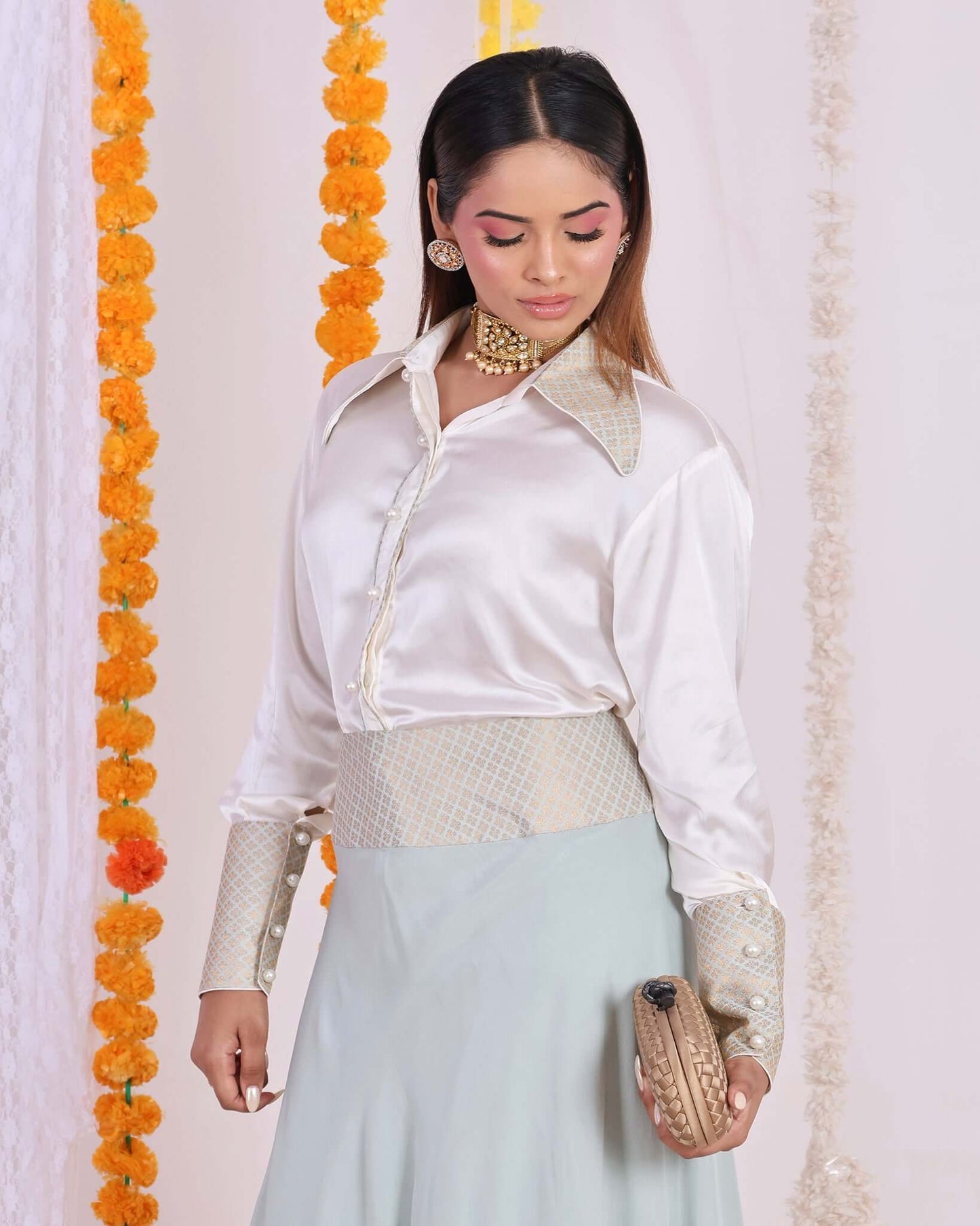 Convey elegance with this ivory satin shirt and mint green brocade skirt coord set for women - a fusion of modern style and traditional charm.