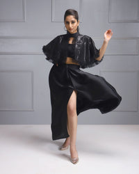 The model is sporting a stunning House Of Majisha black party dress perfect for women's evening wear,
