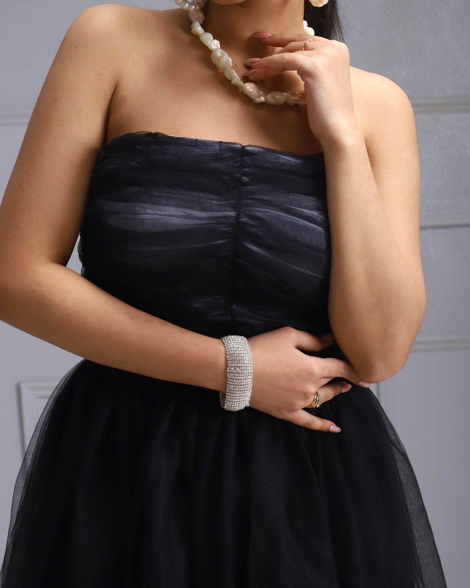 Black Tulle Dress - A chic and playful strapless black tulle dress perfect for fun party wear and evening outfits."