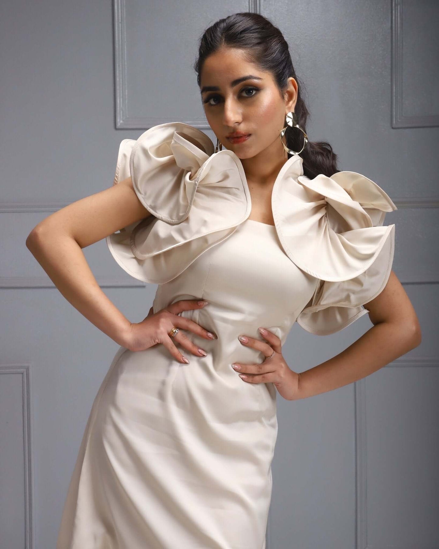 1. "Women's fashion"
2. "House of Majisha Clothing"
3. "Satin Ruffle Dress"
4. "Elegant Women's Attire"
5. "Luxury Women