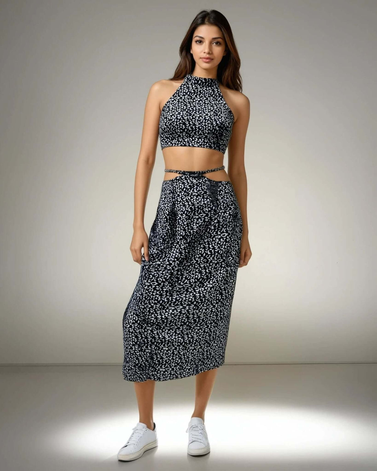 Model showcasing the Blue Bliss Two-Piece Set, featuring a halter neck top and stylish skirt from House Of Majisha, perfect for summer vacations and brunch outings.