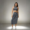 Model showcasing the Blue Bliss Two-Piece Set, featuring a halter neck top and stylish skirt from House Of Majisha, perfect for summer vacations and brunch outings.