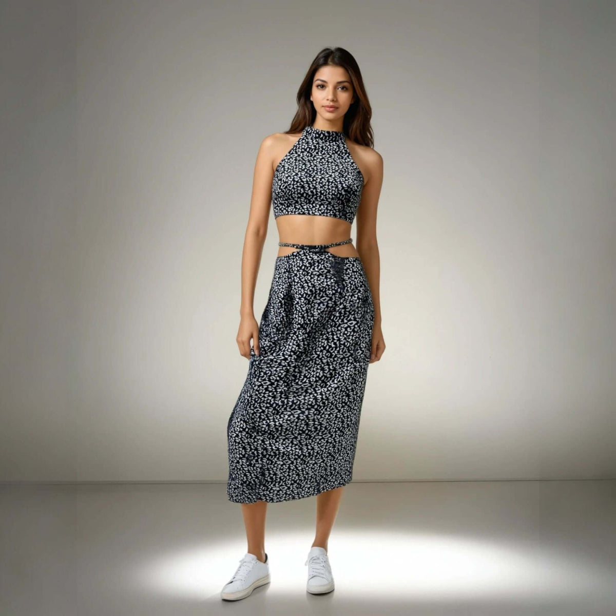 Model showcasing the Blue Bliss Two-Piece Set, featuring a halter neck top and stylish skirt from House Of Majisha, perfect for summer vacations and brunch outings.