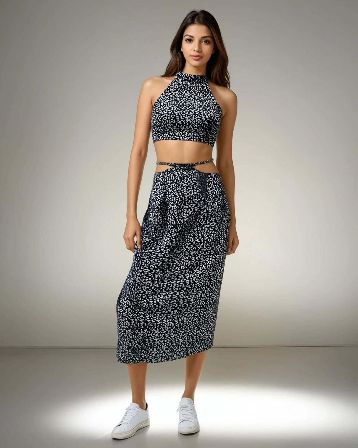 Model showcasing the Blue Bliss Two-Piece Set, featuring a halter neck top and stylish skirt from House Of Majisha, perfect for summer vacations and brunch outings.