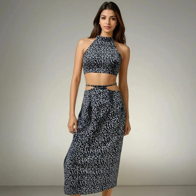 Model showcasing the Blue Bliss Two-Piece Set, featuring a halter neck top and stylish skirt from House Of Majisha, perfect for summer vacations and brunch outings.