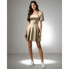 Featuring a sweetheart neckline, puff sleeves, and a stylish crop jacket, perfect for parties and celebrations, Model showcasing the Chic Celebration Jacket Dress in beige from House of majisha.