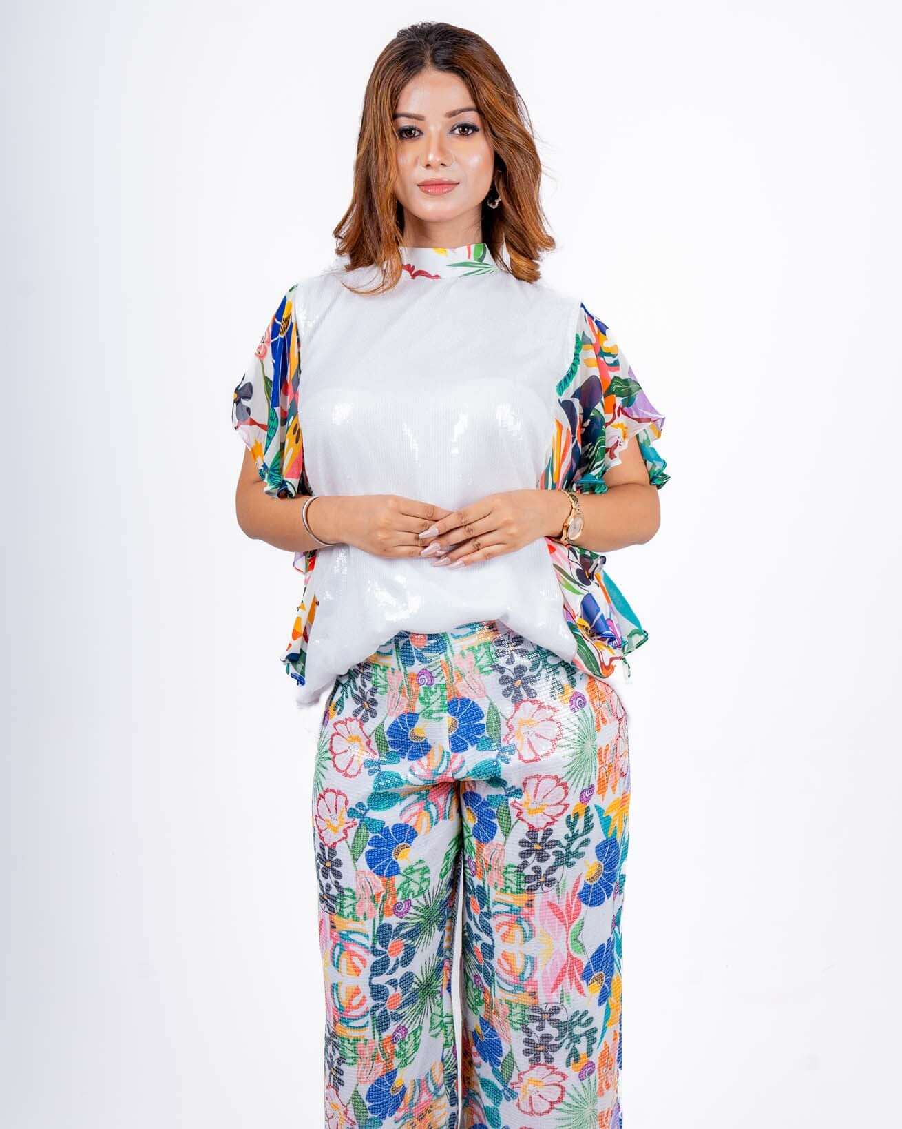 Vibrant white Sequin Coord Set with playful floral print, perfect for a breezy summer day or casual outing.