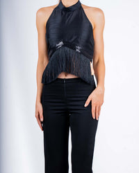 Black halter top with fringe details and backless design, perfect for evening parties and nights out