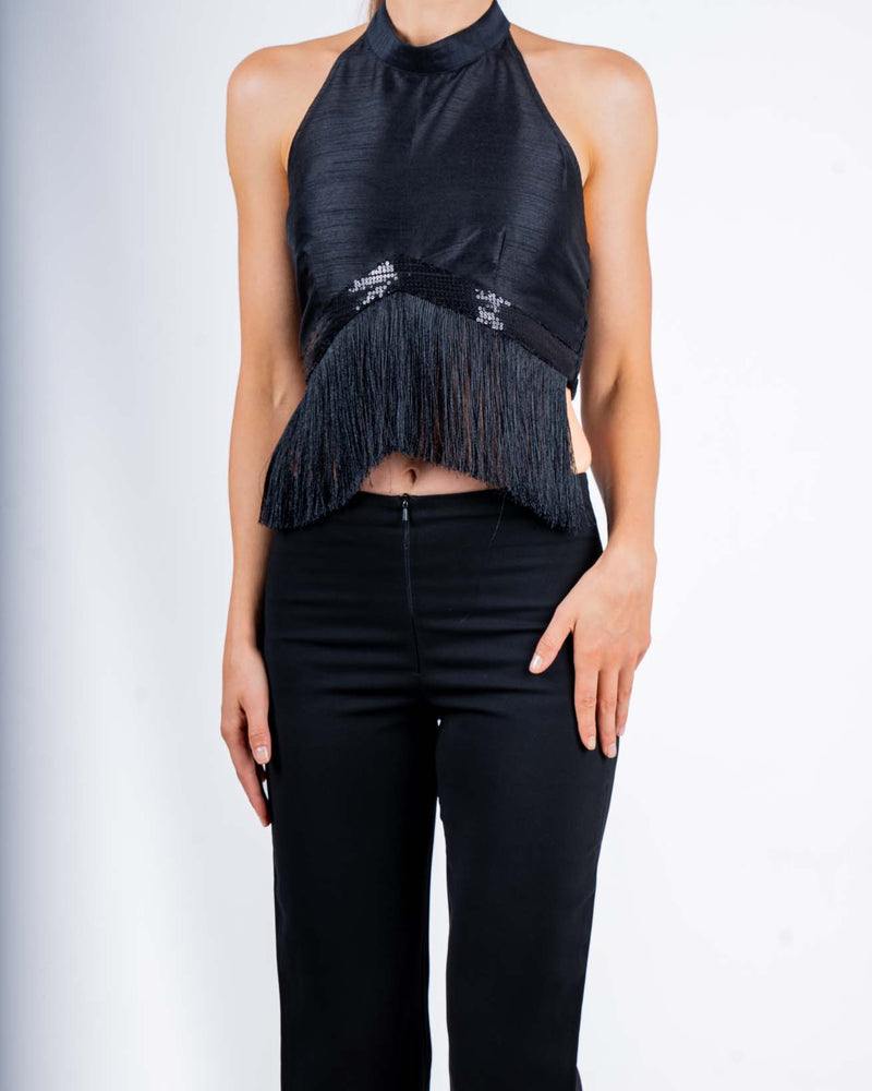 Black halter top with fringe details and backless design, perfect for evening parties and nights out