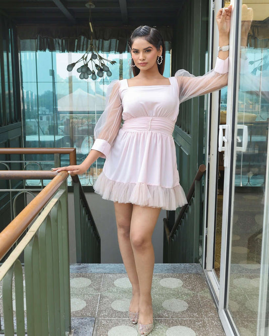 Concise and descriptive alt text for a product image of women's clothing: Elegant Tulle Ruffle Georgette Party Dress featuring playful ruffle detail, layered tulle skirt, and puffy sheer sleeves for a feminine and fun look.