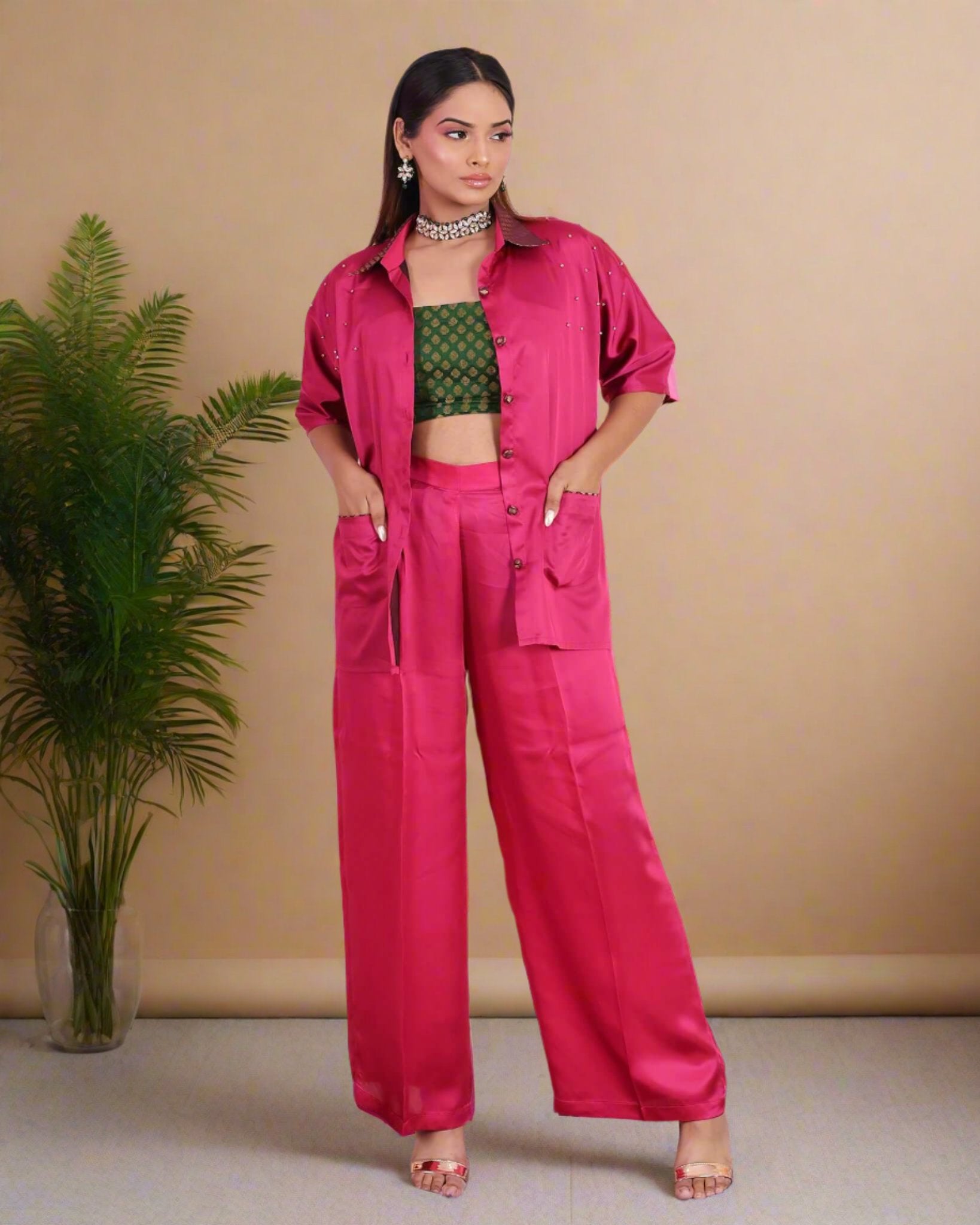 Vibrant Fuchsia Pink Satin Coord Set for Women - Featuring a stylish oversized shirt with brocade accents, wide-legged pants, and a green brocade crop top. Perfect for festive and party wear.