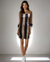 Model showcasing the Glamour Glitter Dress in rose gold and blue sequins from House Of Majisha, featuring net detailing on the neckline, perfect for parties and clubbing.