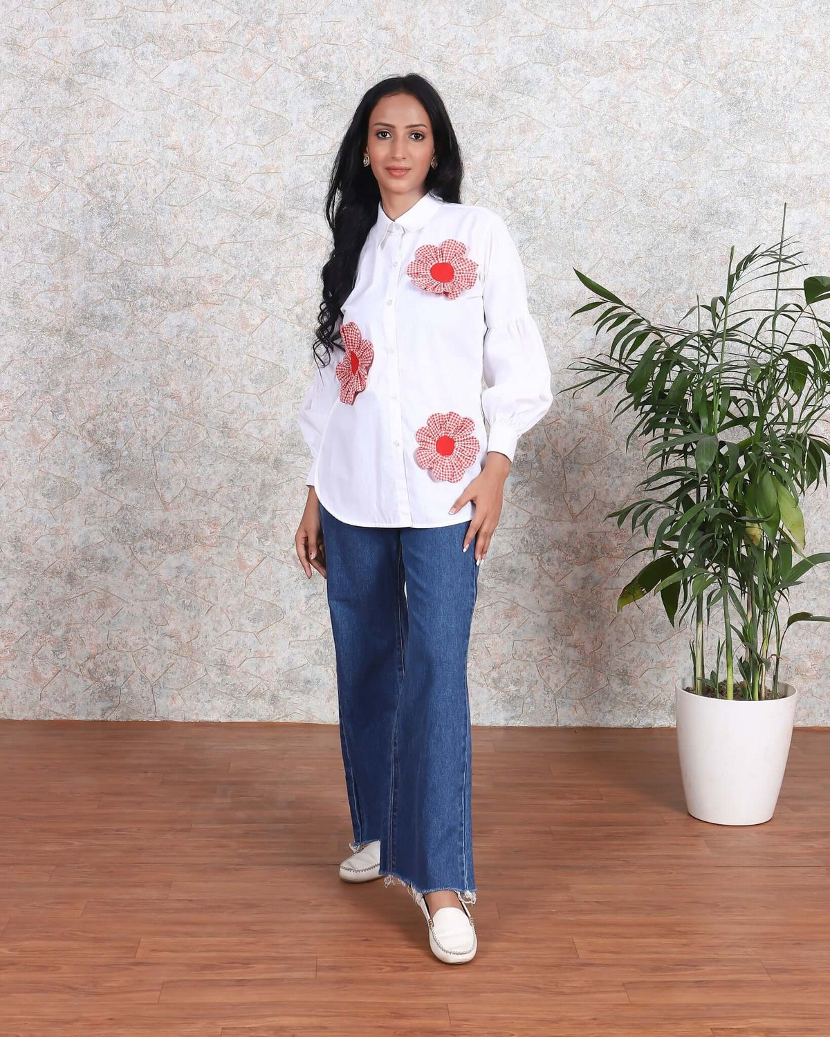 Trendy women's white cotton shirt with bold red floral appliqués, worn by a woman, perfect for casual summer fashion by House Of Majisha