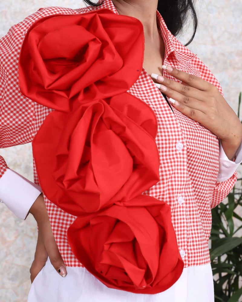 Women wearing House of Majisha red stripe cotton shirt with dramatic ruffled sleeves, perfect for a trendy and casual summer fashion statement.