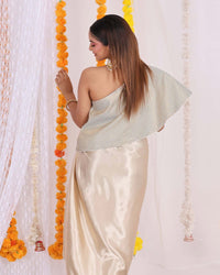 Grey Brocade Top with Golden Satin Dhoti - Elegant one-shoulder top paired with draped dhoti for a stylish Indo-Western look.