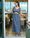 Blue Printed Cut-Out Maxi Dress - A stylish and vibrant women's maxi dress with a trendy cut-out design at the waist, featuring a metallic ring. Perfect for sunny getaways and beach parties.