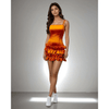 Model showcasing the Ruffle Radiance Dress in vibrant orange satin with ruffle detailing at the bottom from House Of Majisha, ideal for parties and brunch outings.