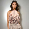 Model wearing the Ruffle Radiance Set, featuring a baby pink ruffle top and matching skirt from House Of Majisha, styled for a playful and trendy look.