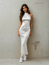 Women Standing And Posing For A Camera Wearing A Chic Satin Mermaid Dress From House Of Majisha.
