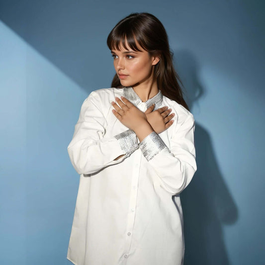White Satin Shirt with Silver Sequin Collar and Cuffs from House Of Majisha, A stylish white satin button-down shirt featuring a shimmering silver sequin-embellished collar and cuffs, adding a touch of elegance.