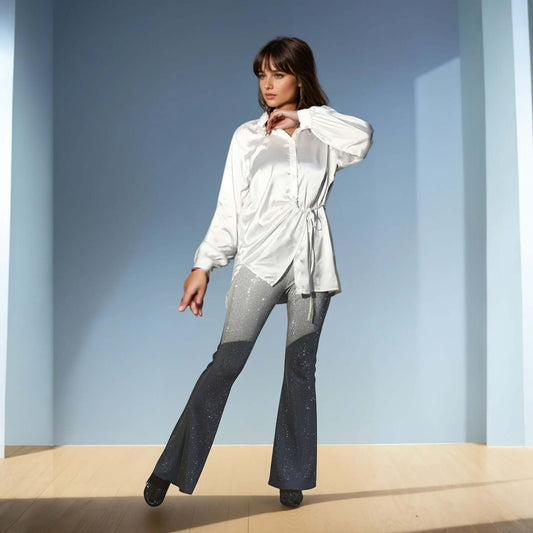 Model wearing elegant white satin shirt with drawstring waist and voluminous sleeves from House Of Majisha